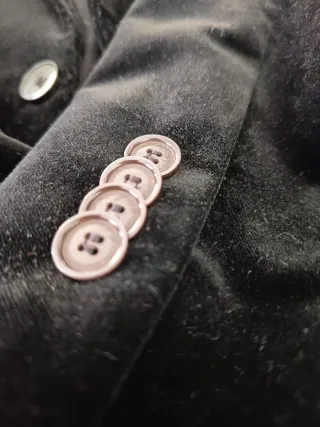 Americana de terciopelo negra