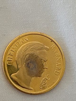 Moneta Christian Barnard placcata oro