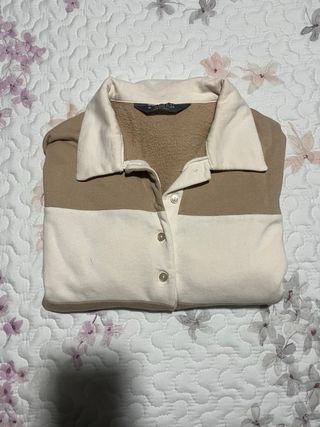 Jersey de rayas beige y marrón