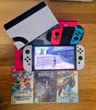 Nintendo Switch OLED + 2 Joy-Con extra e giochi
