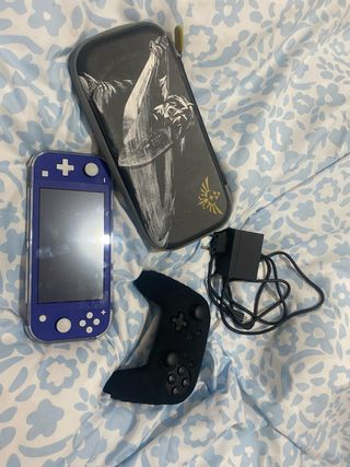 Nintendo Switch Lite + Mando + Cargador + 2 juegos