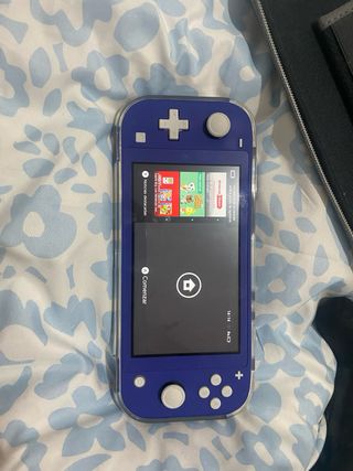 Nintendo Switch Lite + Mando + Cargador + 2 juegos