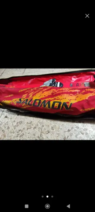 Esquís y bastones Quechua rojos