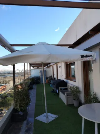 Sombrilla Mahou terraza