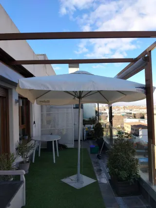 Sombrilla Mahou terraza