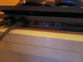 PS4 Pro Negra + 5 Juegos