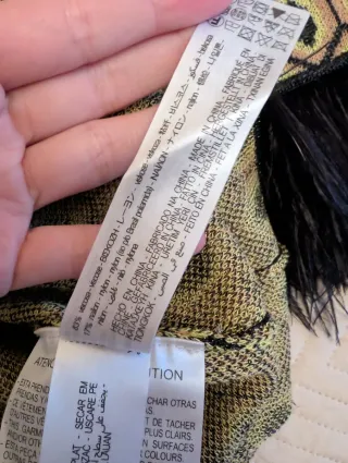 Conjunto Zara plumas verde y negro