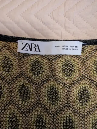 Conjunto Zara plumas verde y negro