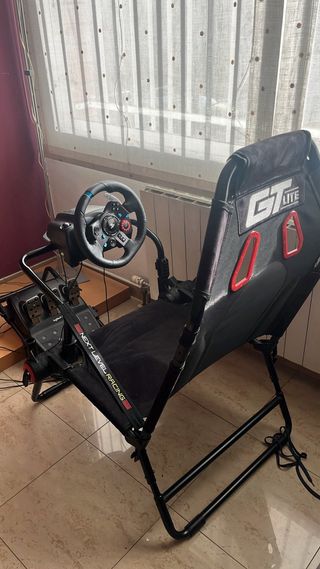 Volante Logitech y Silla F1 usado muy poco .