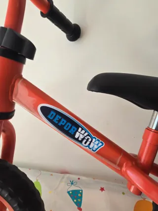 Bicicleta de equilibrio infantil naranja