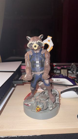 Soporte Mando/Móvil rocket Raccoon cable Guys