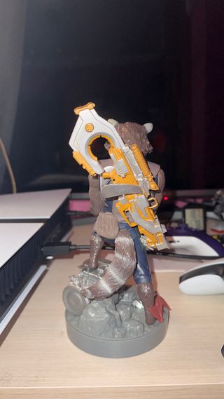 Soporte Mando/Móvil rocket Raccoon cable Guys