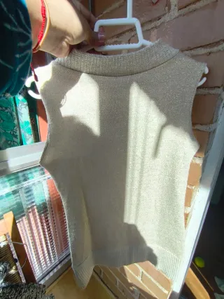 Chaleco dorado brillante