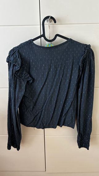 Blusa negra con brillos