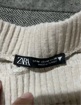 Conjunto top cuello alto sin mangas y pantalón