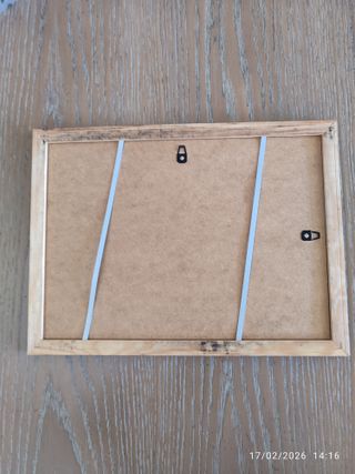 Cornice in legno con bordo dorato