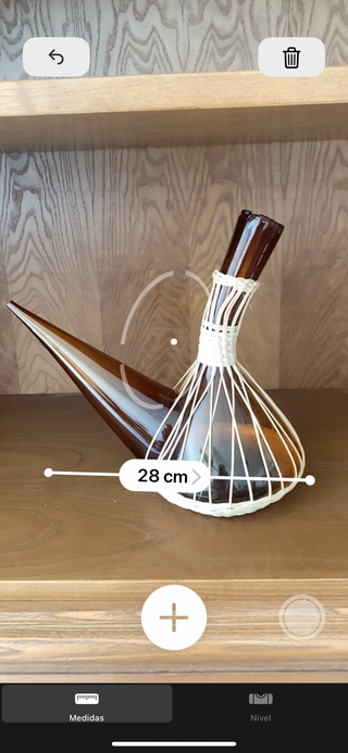 Porrón cristal ámbar con mimbre vintage