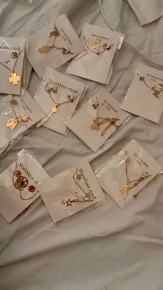 Conjunto de pendientes y collar acero