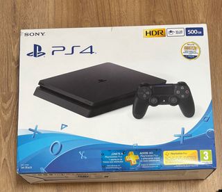 PS4 (PlayStation 4) Negra. Mando, 2 juegos ycaja