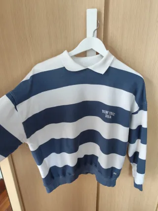 Jersey rayas azul y blanco cuello polo