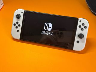 Nintendo Switch OLED + extras