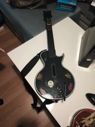 Xbox 360 con Guitar Hero y Rock Band