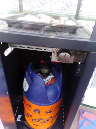 Estufa de gas con piedras decorativas