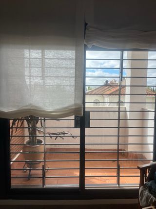 Ventana aluminio corredera con rejas