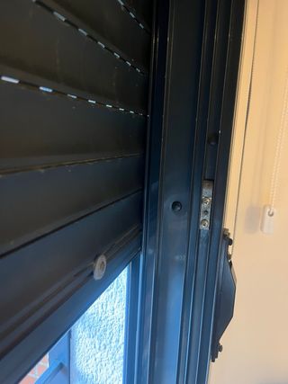 Ventana aluminio corredera con rejas