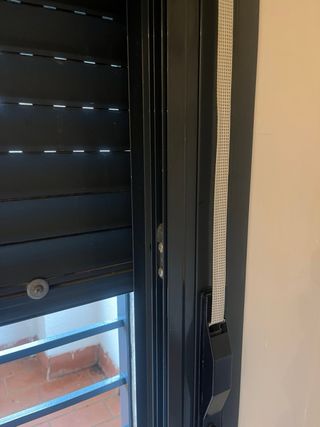 Ventana aluminio corredera con rejas