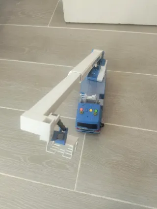 Grúa extensible de juguete con luces y sonidos