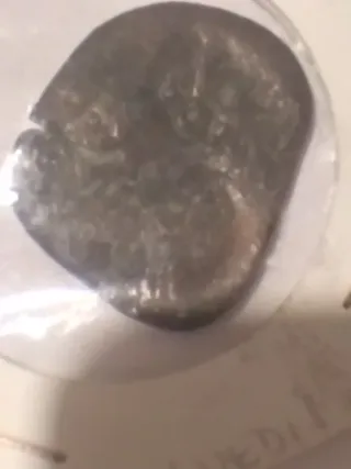 Moneda Felipe IV con resello 1677