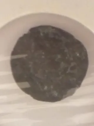 Moneda Felipe IV con resello 1677