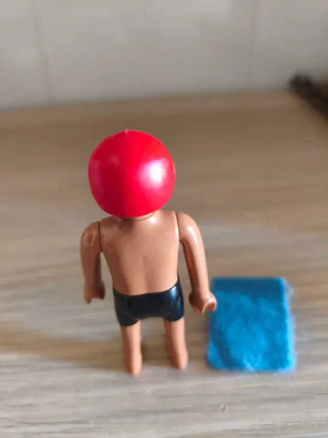 Playmobil nadador con toalla azul