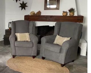 Dos sillones tipo butaca gris