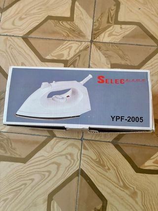 Plancha de ropa blanca