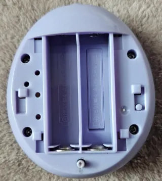 Tamagotchi Meets Magic Morado