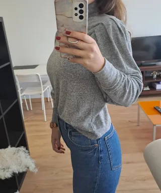 Jersey gris cuello alto mujer