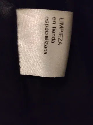 Chaqueta de cuero larga hasta arriba de la rodilla