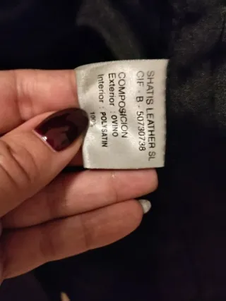 Chaqueta de cuero larga hasta arriba de la rodilla