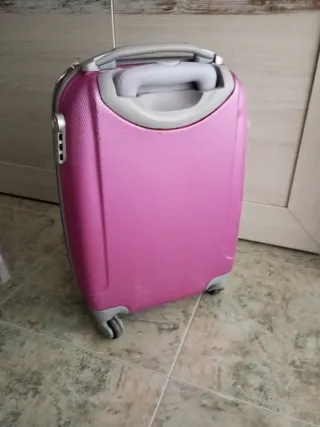 Maleta pequeña rosa con dibujos