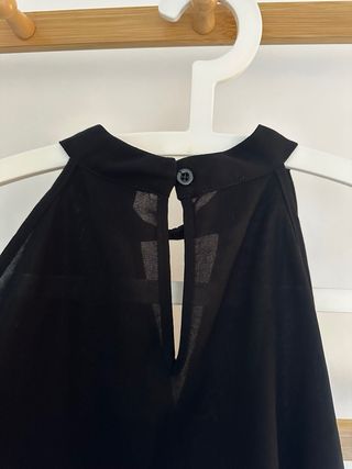 Blusa negro con hombros descubiertos