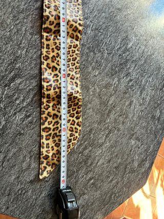 Cinturón estampado leopardo con hebilla redonda