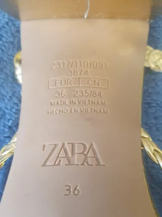 Sandalias doradas Zara trenzadas