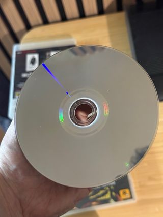 Playstation 3 + 2 mandos y 36 juegos y mandos buzz