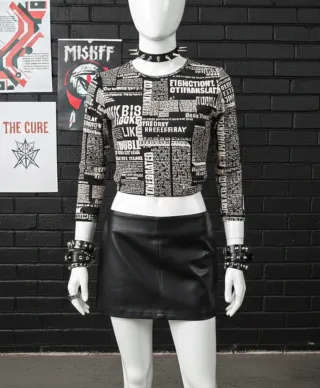 Top estampado periódico grunge