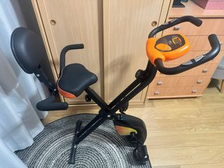 Bicicleta Estática Naranja y Negra