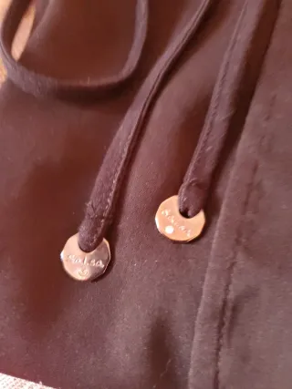 Conjunto Top Negro salsa y bermuda cuadros.