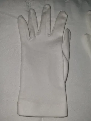 Guantes blancos penitente