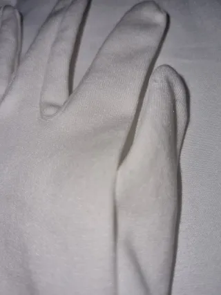 Guantes blancos penitente